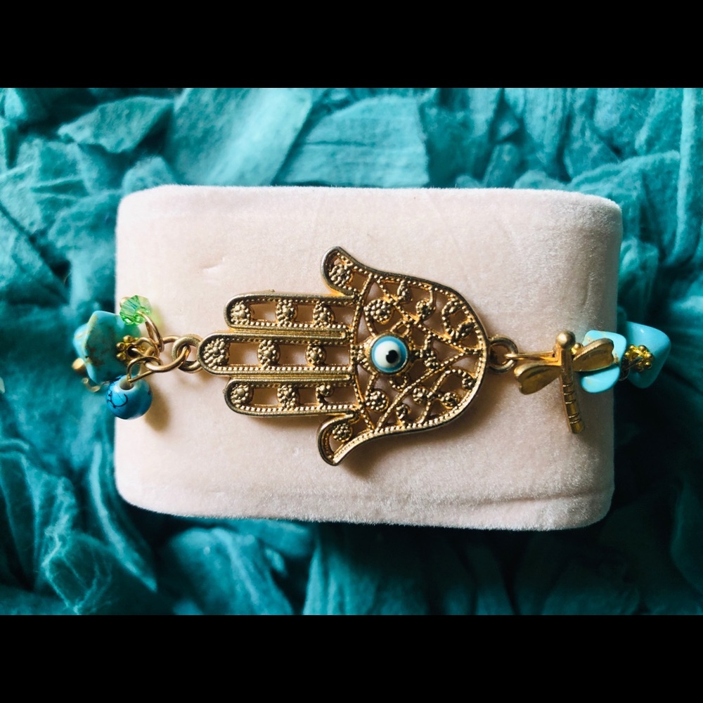 Boutique jeweled bracelet with charms